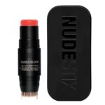 Nudies Bloom All Over Dewy Color róż w sztyfcie Poppy Girl 7g